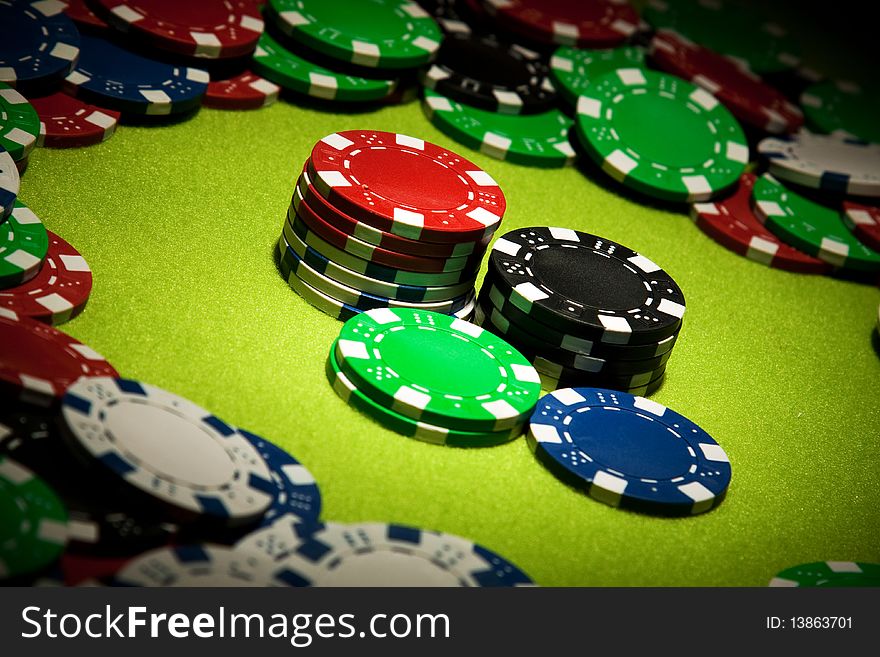 Casino Chips Closeup In Pointed Light