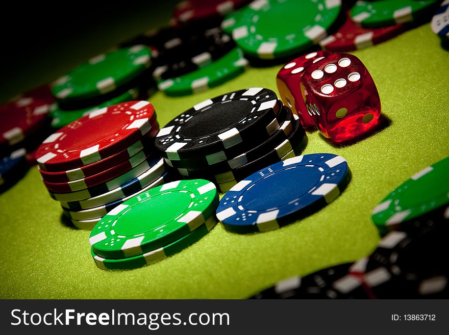 Casino concept shot in studio on green background. Casino concept shot in studio on green background