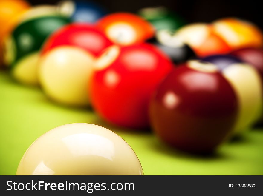 Poolballs in green background shot in studio. Poolballs in green background shot in studio