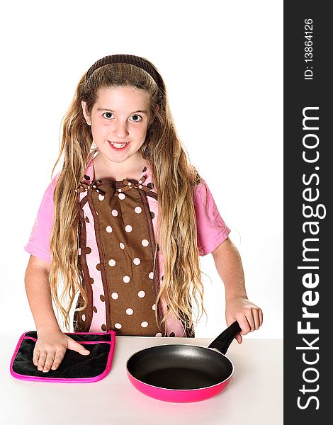 Shot of a little chef with apron ready to cook