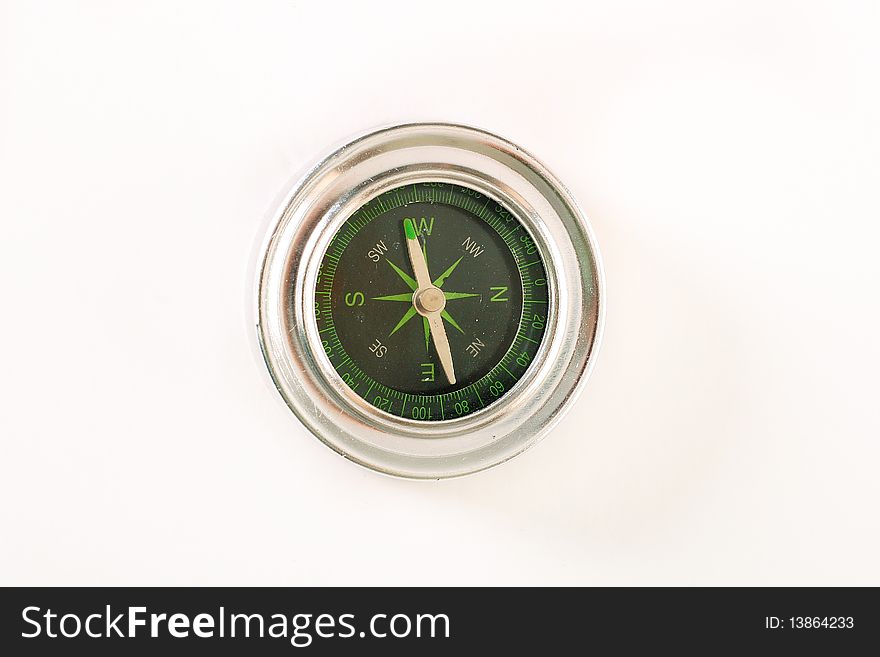 Shot of a compass on white