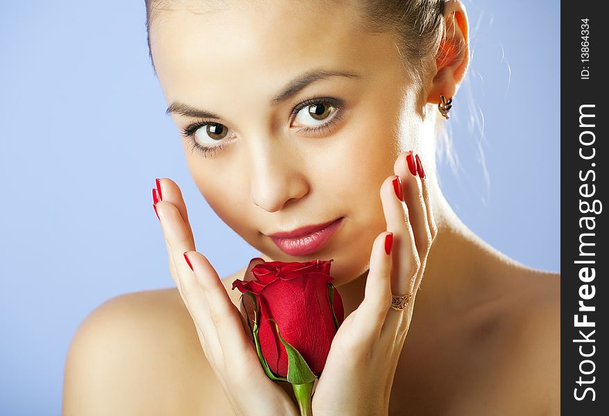 Studio portrait of sensual beautiful woman with rose. Studio portrait of sensual beautiful woman with rose