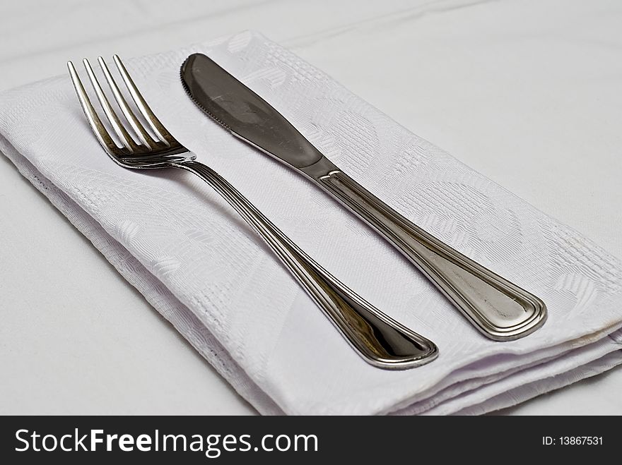 Cutlery on the table prepared to eat. Cutlery on the table prepared to eat.