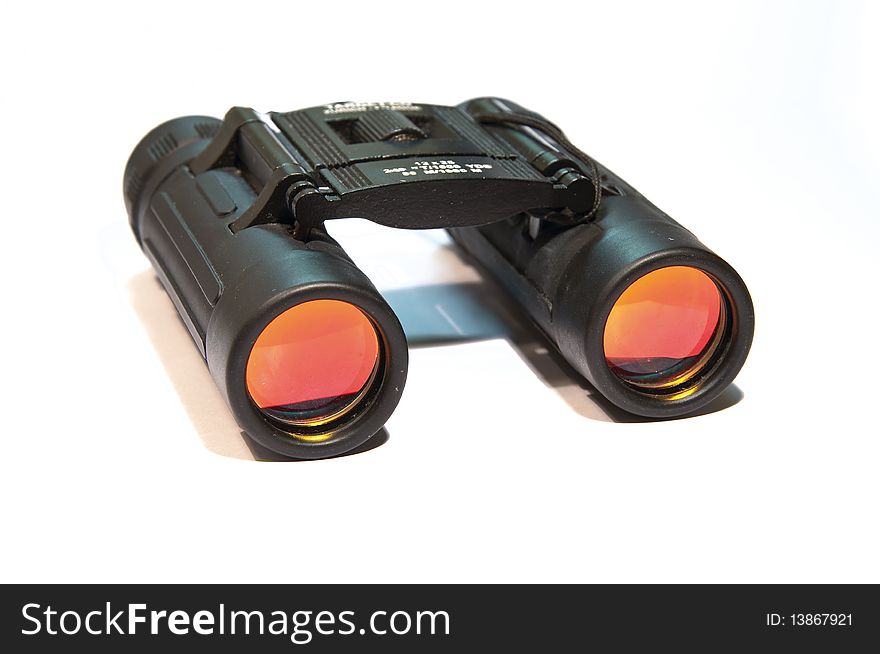 Black binoculars on a white background