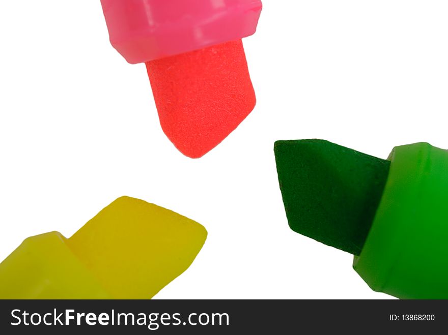 Some colour markers close up isolated in white