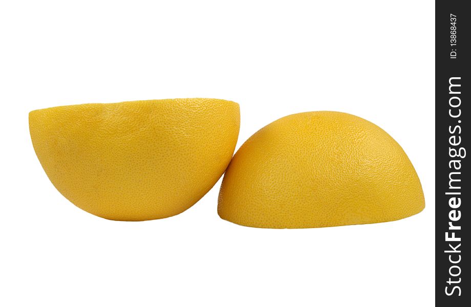 Two Halves Of Fruit Pomelo Lie Nearby