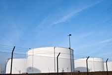 White Tanks In Tank Farm With Blue Clear Sky Royalty Free Stock Image White Tanks In Tank Farm With Blue Clear Sky Royalty Free Stock Image