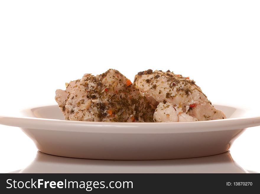 Chicken meat on dish with white isolated background