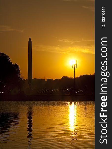 Washington monument at sunset with reflection in pool. Washington monument at sunset with reflection in pool