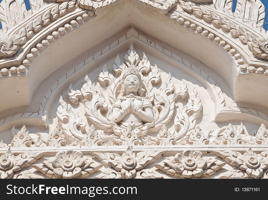 Thai Carved Angel at the temple door, Petchburi Thailand