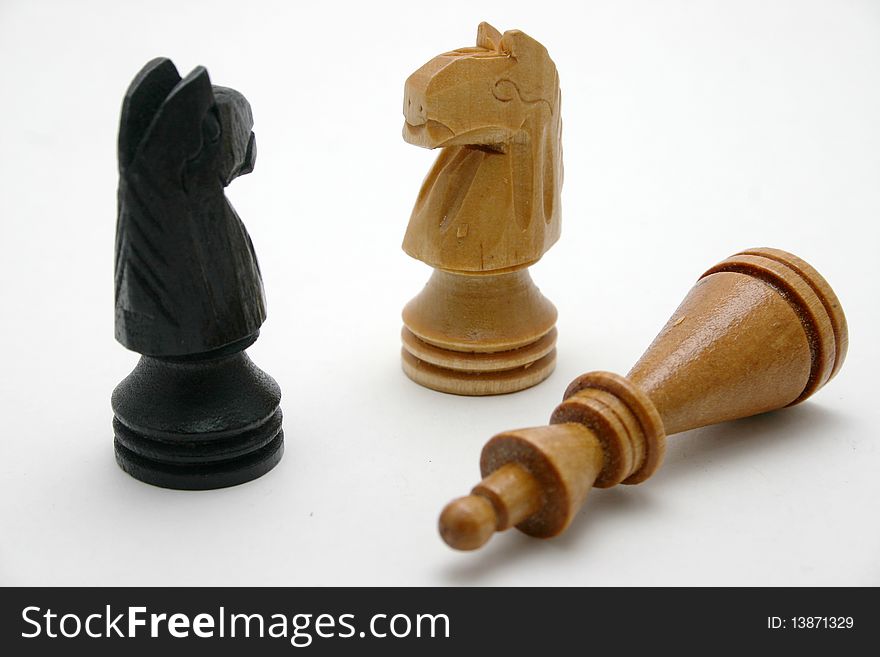 Wood chess game pieces knight and queen. Wood chess game pieces knight and queen.