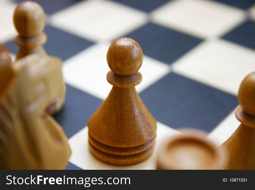 Wood Chess game with pawn detail. Wood Chess game with pawn detail.