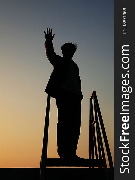 Outline of a worker in shipyard