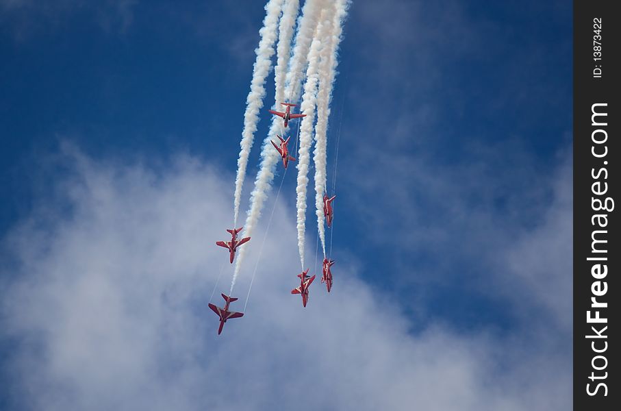 Seven Red aircraft in formation. Seven Red aircraft in formation