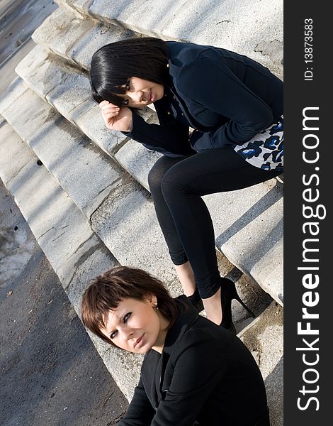 Two female friends walking outdoor