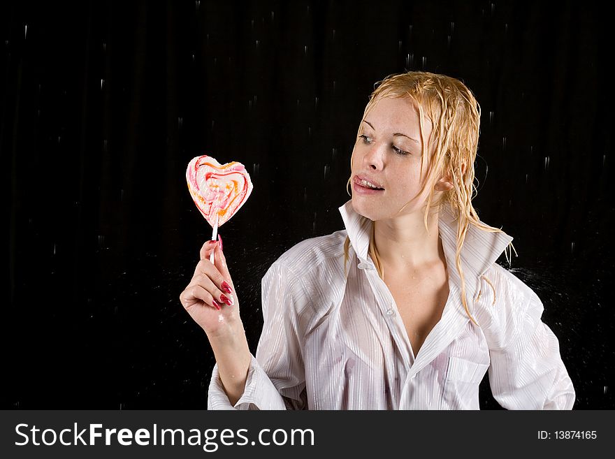 Girl with lollipop in aqua studio