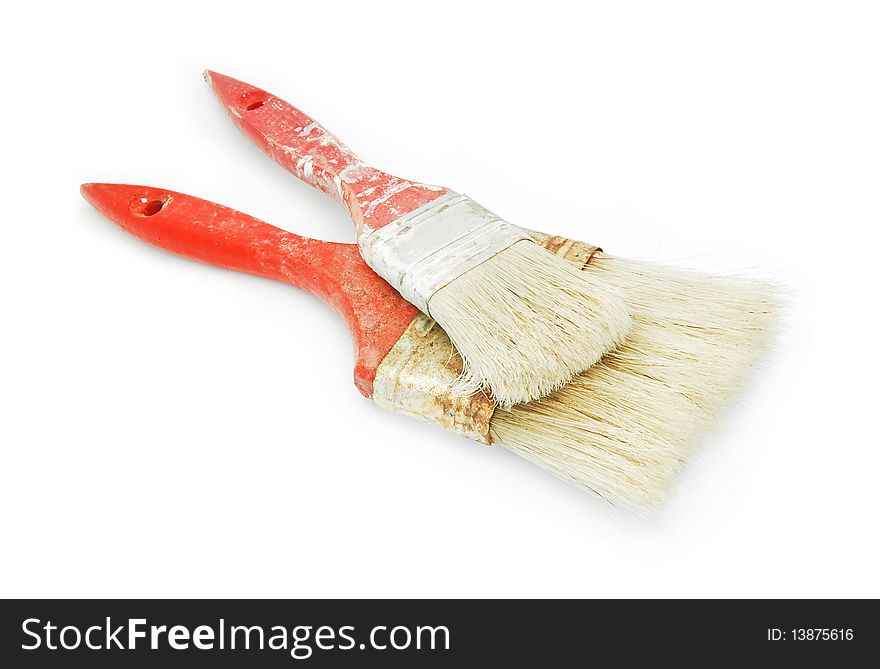 Used paint brushes isolated on white