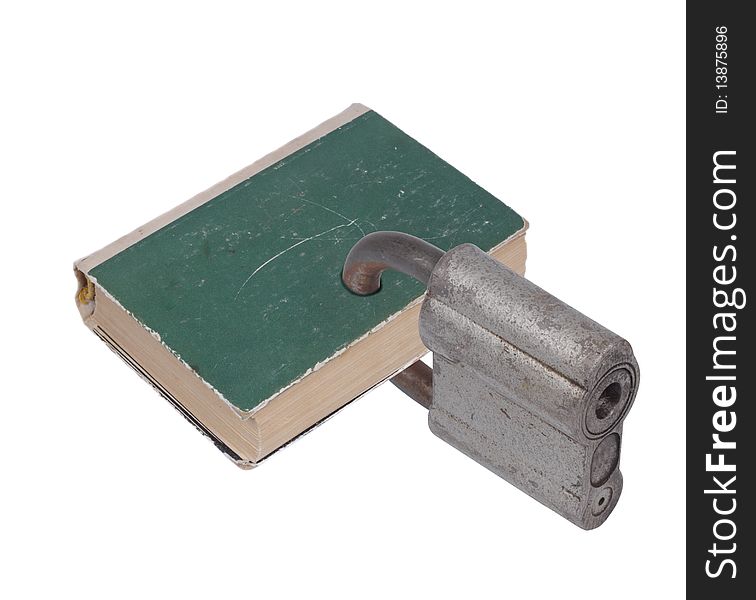 The book closed on the padlock. Isolated object on a white background