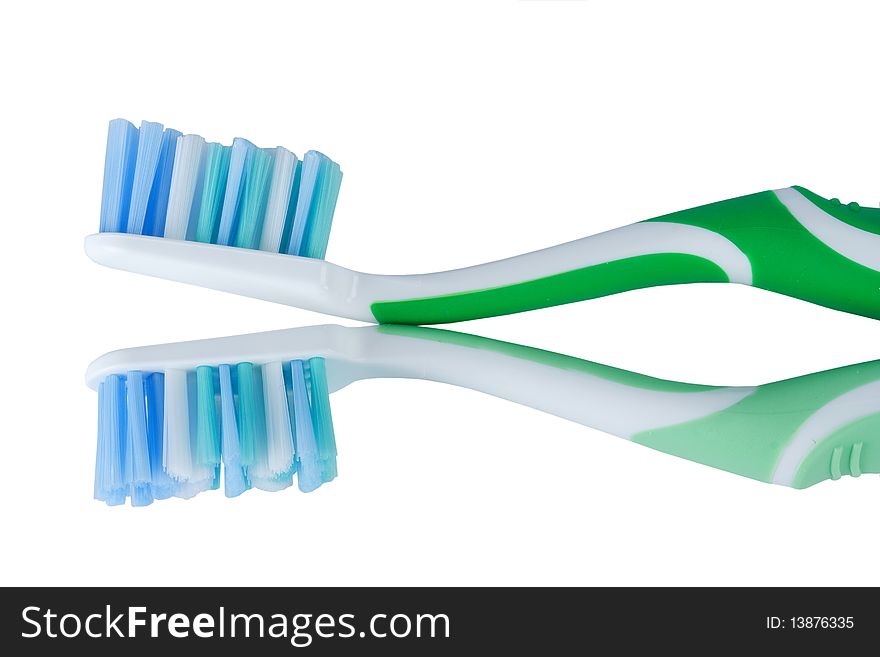 Two tooth-brushes it is isolated on a white background