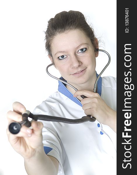 Nurse with stethoscope looking at camera