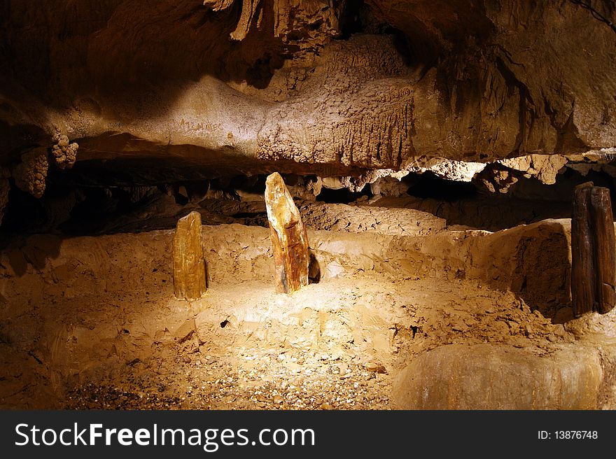 Stalactites and stalagmites in ancient caves of Borneo.