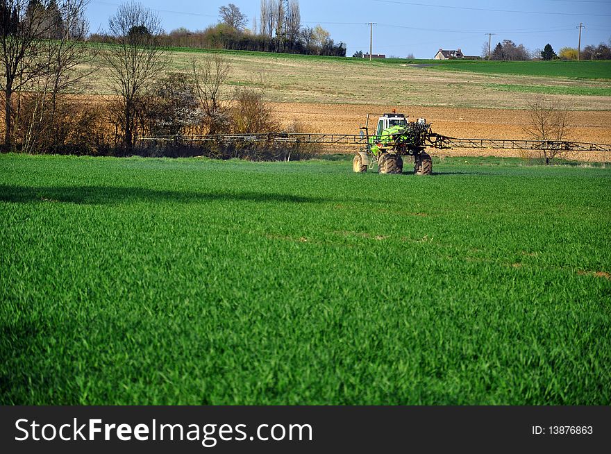 An area of cultivation traited by a tractor. An area of cultivation traited by a tractor