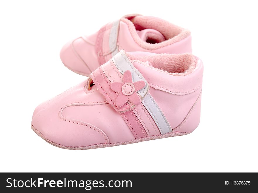 Pink shoes for baby girl on a white background. Pink shoes for baby girl on a white background.