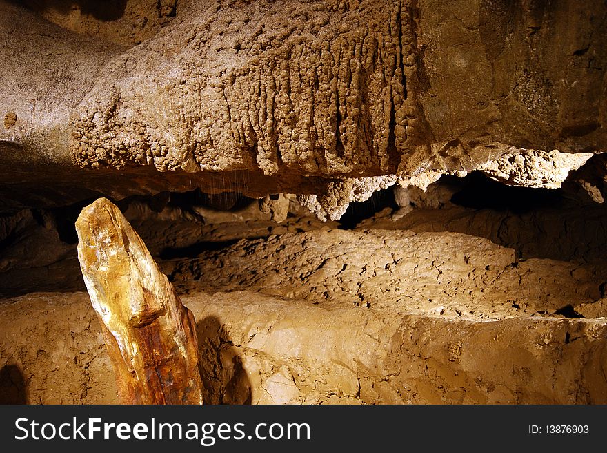 Stalactites and stalagmites in ancient caves of Borneo.