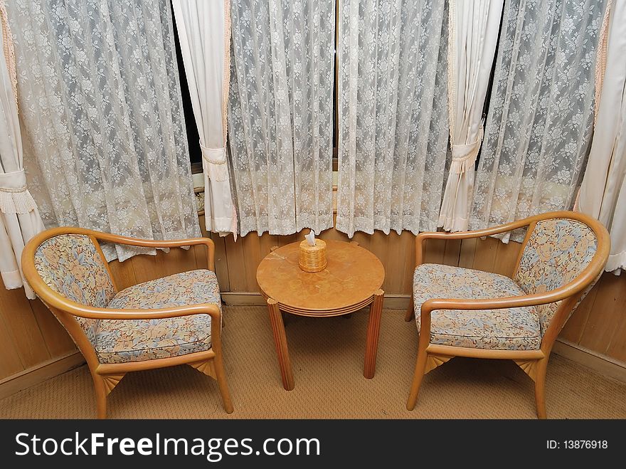 Tea table and chairs for resting in hotel room