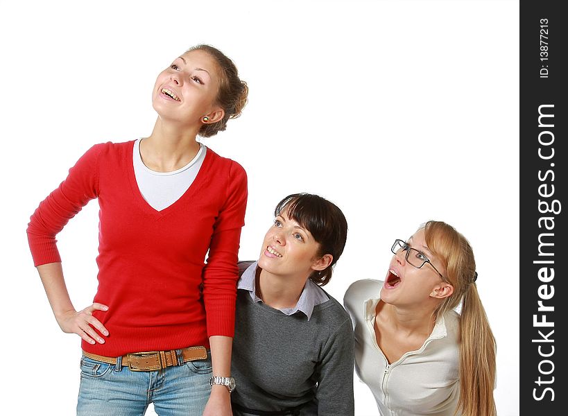 Three girls-girl-friends look upwards