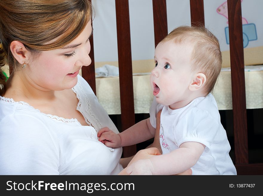 Young beautiful mother with litlle cute baby daughter. Young beautiful mother with litlle cute baby daughter