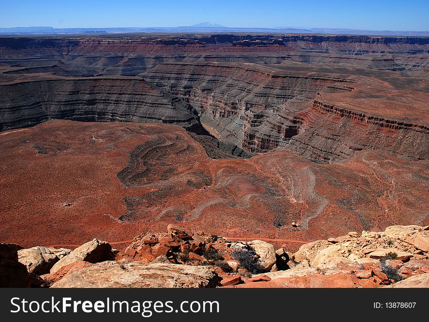 Muley Point, Utah, San Juan River valley and Monument Valley in the distance. Muley Point, Utah, San Juan River valley and Monument Valley in the distance