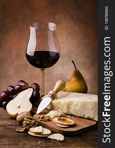 Appetizing Meal With Cheese And Fruit And Wine