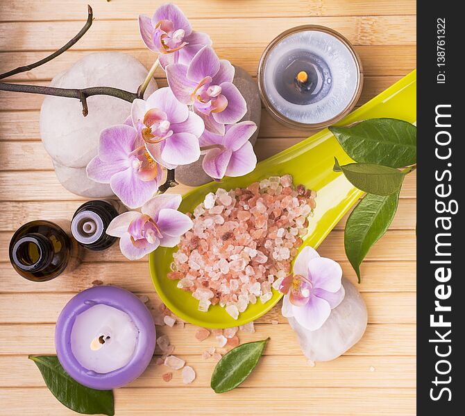 Wellness environment with essential oils, orchid and bath salts