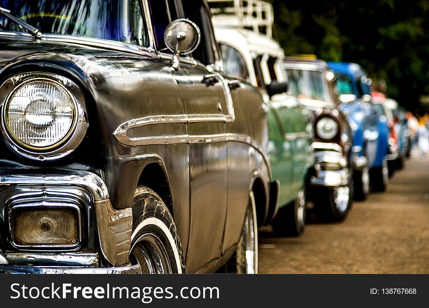 HAVANA- 02 JUN, 2018: American old cars taxis waiting in the line for the tourists and clients