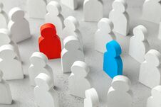 Love Search Concept. The Concept Of Finding Business Partner. Crowd Of White People And Two People A Red Woman And Blue Man. Stock Photos