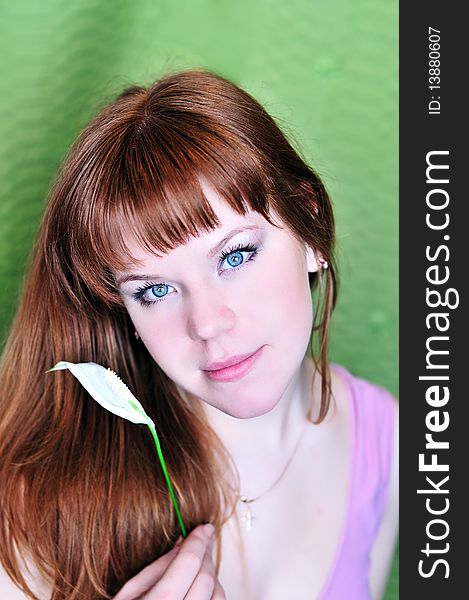 Portrait of redheaded pretty girl with white flower. Portrait of redheaded pretty girl with white flower