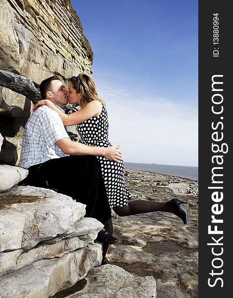 Couple kissing on the beach. Couple kissing on the beach