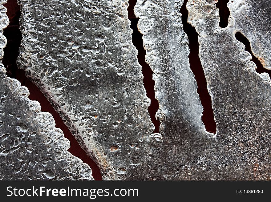 Bizarre torn steel surface