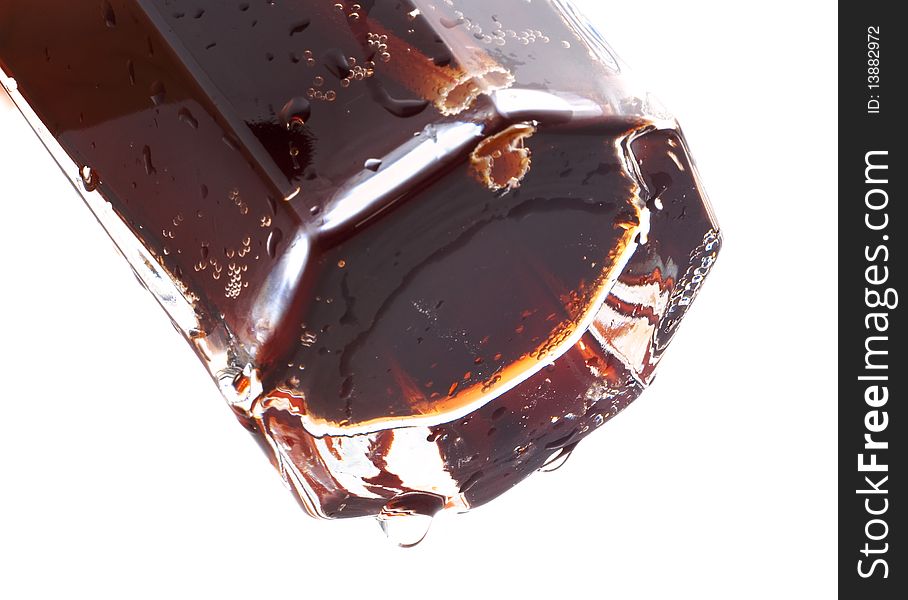 Soda in a glass, a white background