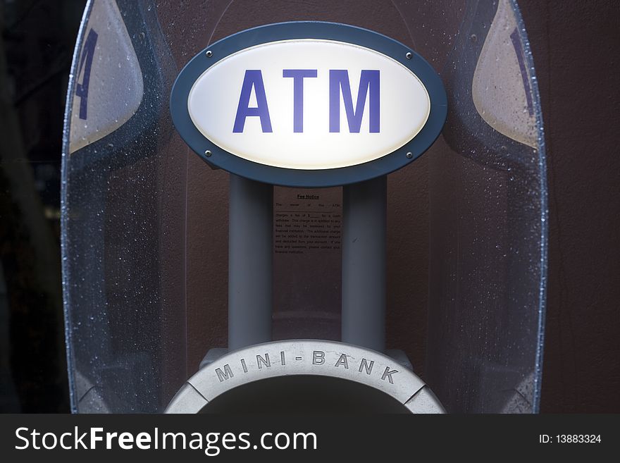 ATM mini-bank detail on a rainy day