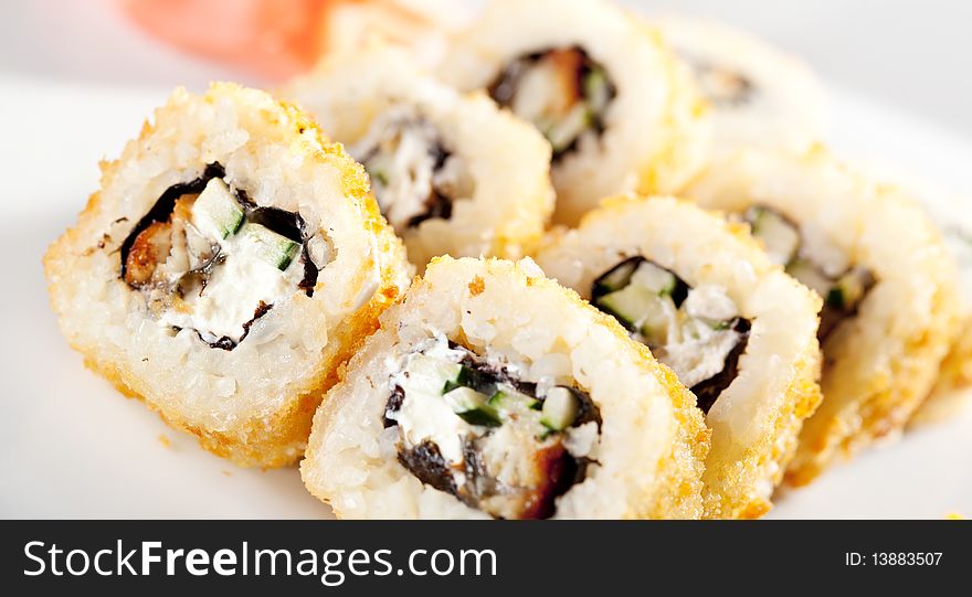 Unagi Fry Maki Sushi - Roll made of Smoked Eel, Cream Cheese and Cucumber. Unagi Fry Maki Sushi - Roll made of Smoked Eel, Cream Cheese and Cucumber