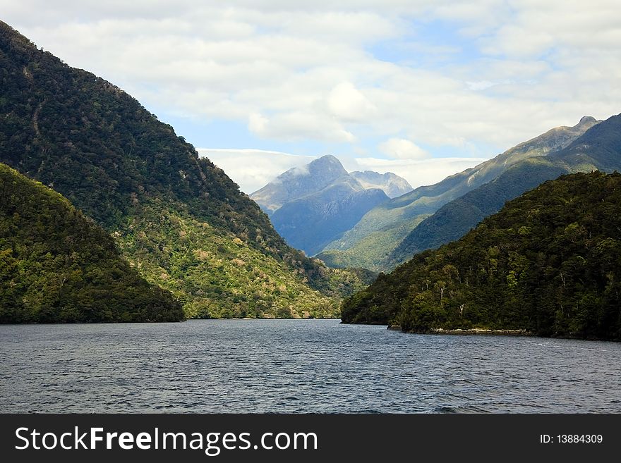 Dramatic clouds over Doubtful Sound, New Zealand South Island.