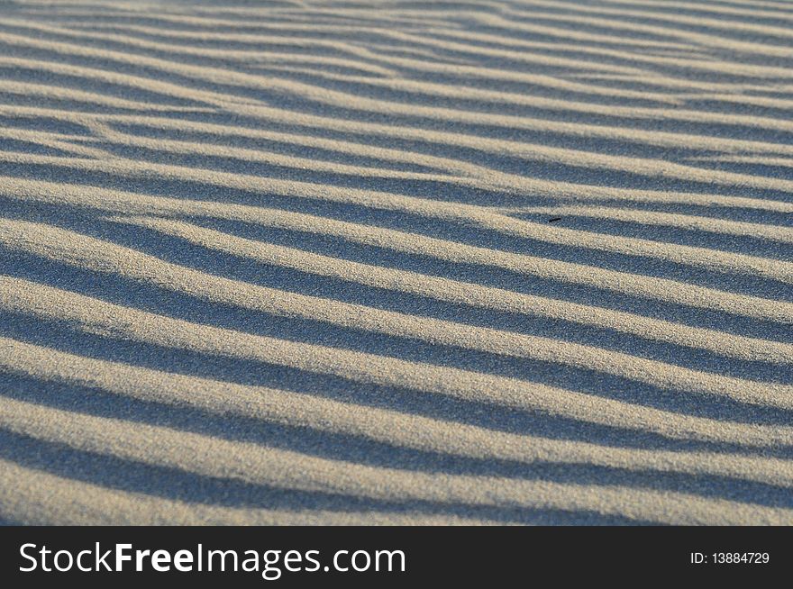 Shadow and light made in sand. Shadow and light made in sand