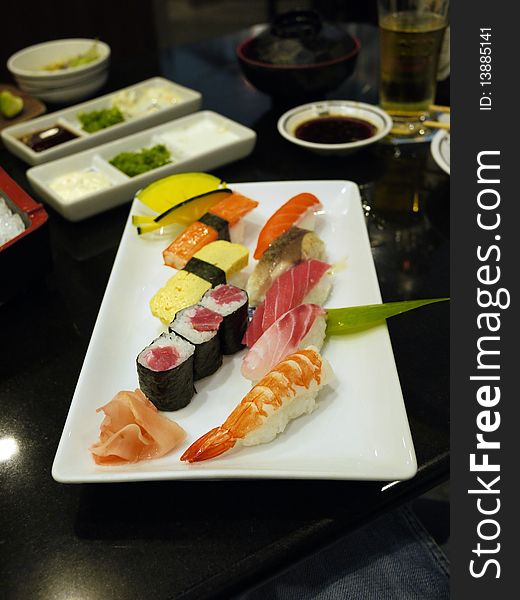 Japanese Food, Sashimi and maki plate with shrimp, salmon, red tuna on rice