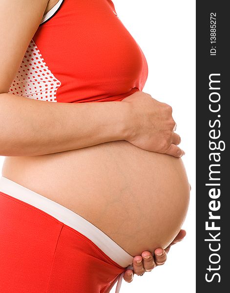 Beautiful pregnant woman on a white background