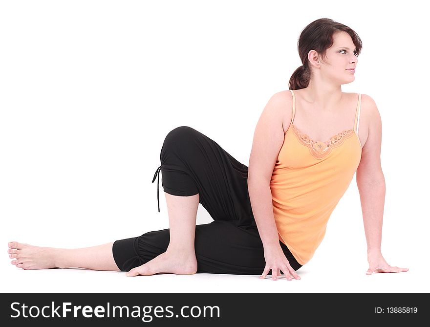 Portrait of young woman in stretching position. Portrait of young woman in stretching position