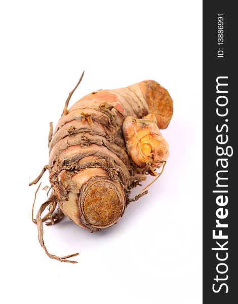 A piece of root ginger isolated on white background.