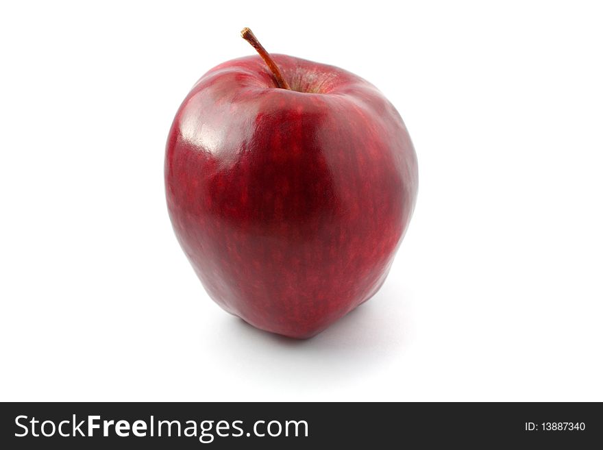 A perfect red apple isolated on white background. A perfect red apple isolated on white background.
