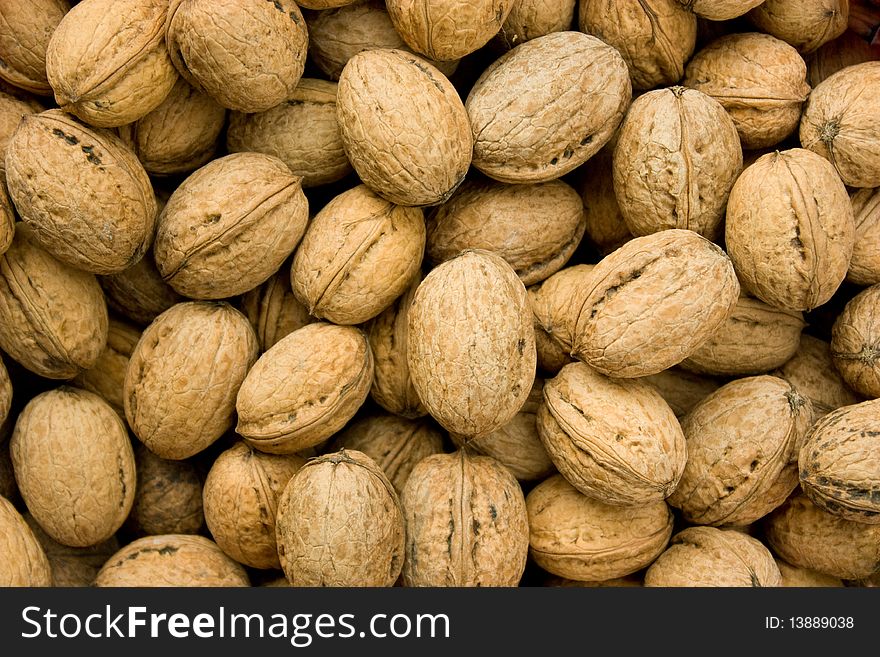 Image a lot of walnuts, closeup